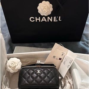 Grained Caviar Clutch 2024